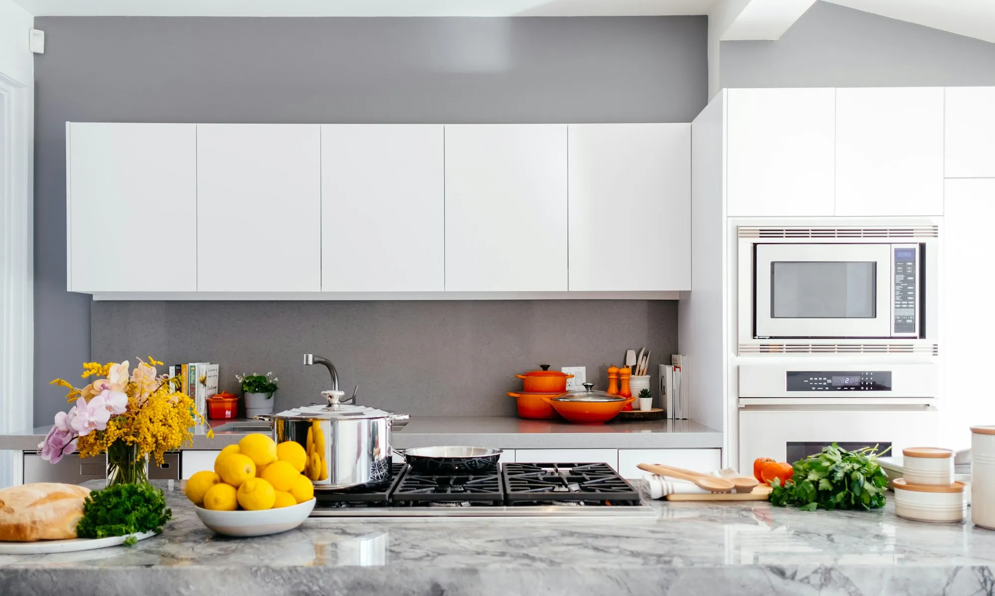 Dark custom kitchen remodel with professional range